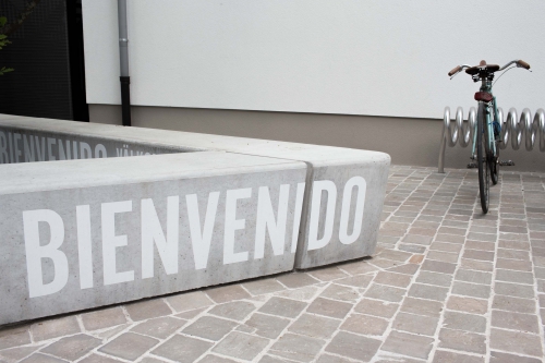 Concrete bench with typography for DeKoninck Antwerp city brewery